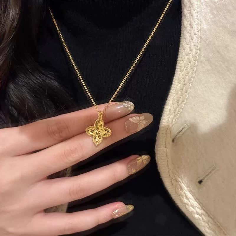 Van Cleef & Arpels Gold and Silver Flower Pendant Necklaces